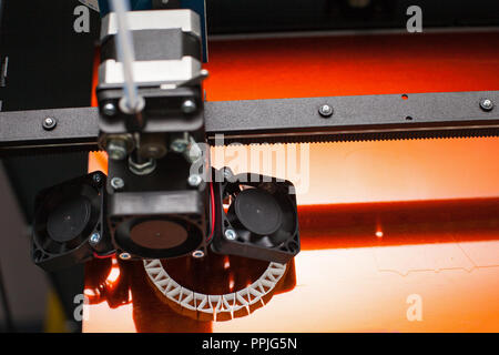 Modern three-dimensional printer during work. Close up printing detail Stock Photo