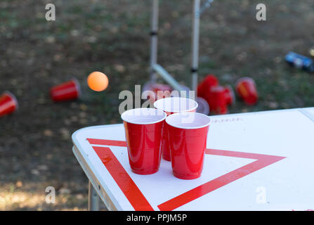 The arrangement of red plastic cups for game of beer pong Stock