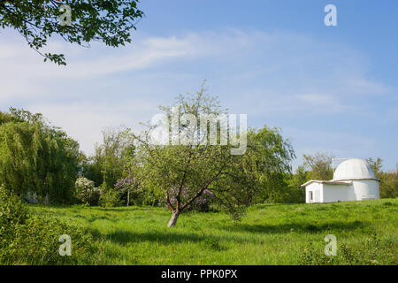 Old Astronomical Observatory of Lviv University in Ukraine. Summer landscape with white astronomy building Stock Photo