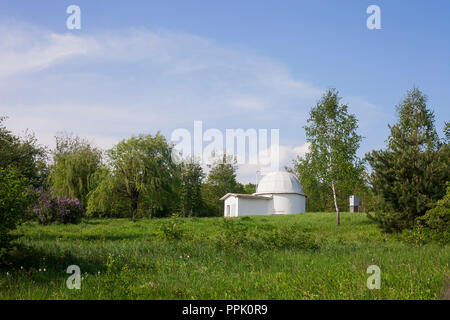 Old Astronomical Observatory of Lviv University in Ukraine. Summer landscape with white astronomy building Stock Photo