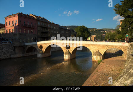 Latin bridge in the city center of Sarajevo over Miljacka river. The Sarajevo Museum is located on the right bank of the river. Stock Photo