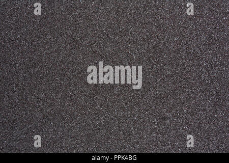 Сlose up of black sandpaper sheet texture, background or backdrop Stock Photo