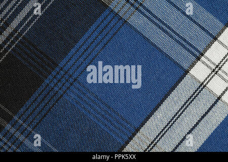 Texture of blue checkered fabric. Cotton fabric close-up. Stock Photo