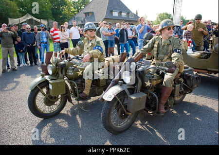 ENSCHEDE, THE NETHERLANDS - 01 SEPT, 2018: Two motorcycle's passing by during a military army show. Stock Photo