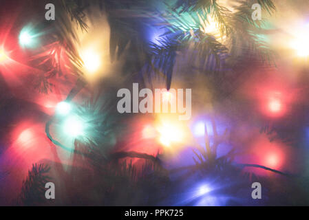 Abstract Christmas holidays composition with glowing garland Stock Photo