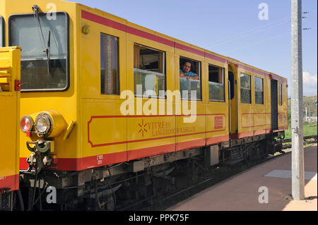 The little yellow train of the Pyrenees waiting for the departure in Font Romeu station Stock Photo