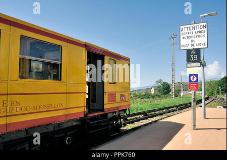 The little yellow train of the Pyrenees waiting for the departure in Font Romeu station Stock Photo