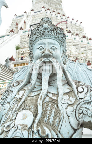 Chinese giant stone statue in Wat Arun, Bangkok, Thailand Stock Photo