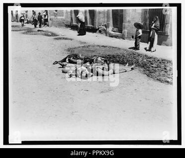 Bodies of dead men piled on a Mexican street Stock Photo