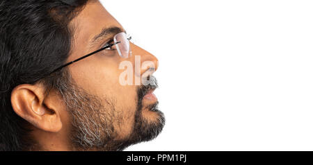 Artistic picture from optics concept of indian man wearing spectacles or eyeglasses isolated on white background with blank copyspace Stock Photo