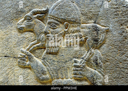 Babylonian bas relief, Babylon. Pergamon museum. Berlin, Germany Stock Photo