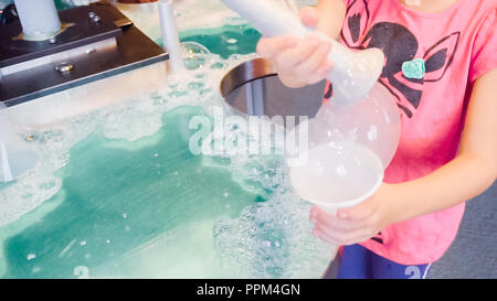 Kids science with bubbles at local science museum. Stock Photo