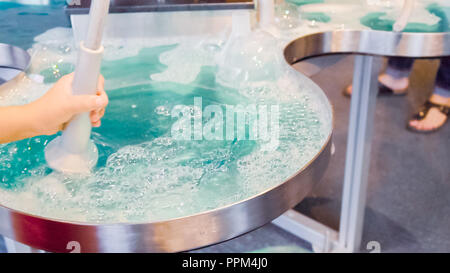 Kids science with bubbles at local science museum. Stock Photo