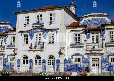 Aveiro, Portugal. The old train station in Aveiro ,decorated with  azulejo tiles depicting life in the city in the last century. Stock Photo