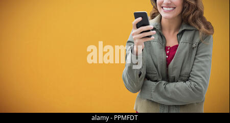 Composite image of image of smiling women interacting with her phone Stock Photo