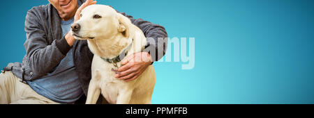 Composite image of smiling old man sitting stroking his pet dog Stock Photo