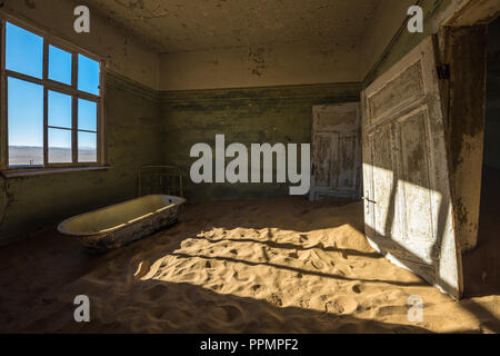 Abandoned ghost town of Kolmanskop in Namibia Stock Photo