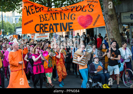 Bristol, UK. 26th September 2018. Protesters brought traffic to a standstill as they marched through Bristol City centre. They want the owners of Hamilton House on Stokes Croft to continue to allow the building to be used by creatives, artists and community groups at affordable rents under the continued management of social enterprise Co-exist.  The protesters say that the owners, Connolloy and Callaghan want to develop the building for profit. Bristol, UK. 26th September 2018 Credit: Redorbital Photography/Alamy Live News