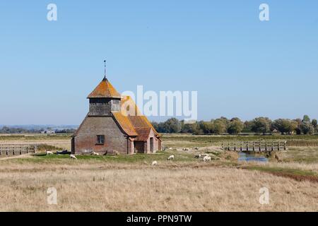 Romney Marsh, Kent, UK. 27th Sep, 2018. UK Weather: Beautiful sunny day on the Romney Marsh. The 13th century St Thomas à Becket Church in Fairfield (pictured) is famously situated alone in a field between water courses and sheep and still holds services on the first Sunday of the month. © Paul Lawrenson 2018, Photo Credit: Paul Lawrenson/ Alamy Live News Stock Photo