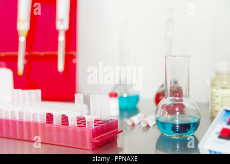 Various laboratory equipment: pipette, test tubes and flasks Stock Photo