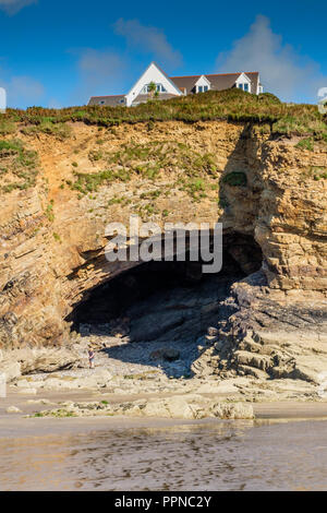 Cave in the cliffs at Little Haven, Pembrokeshire, Wales Stock Photo