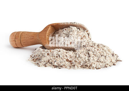 Pile of buckwheat flour with wooden scoop isolated on white background Stock Photo