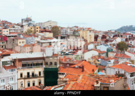 Drone flying above old city, selective focus Stock Photo