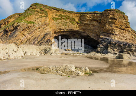 Cave in the cliffs at Little Haven, Pembrokeshire, Wales Stock Photo
