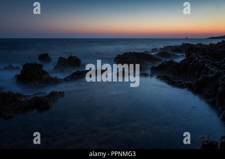 Beautiful landscape and nature photo of sunset at Adriatic Sea in Croatia Europe. Nice colorful outdoors image. Calm, peaceful picture of ocean Stock Photo