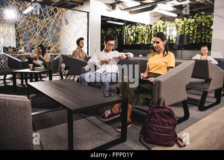 group of multicultural businesspeople working at modern coworking office Stock Photo