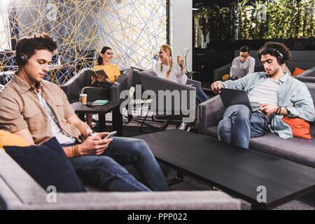 group of multicultural businesspeople working at modern coworking office Stock Photo