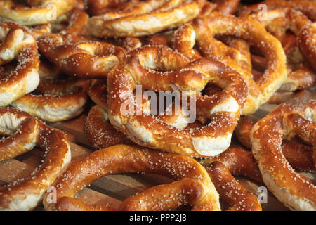 Background of pretzels on a market stall Stock Photo