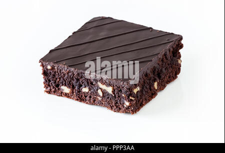 Chocolate vegan brownie cake with nuts pink. Isolated. Selective focus. Stock Photo