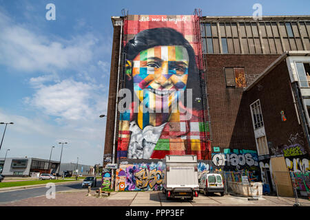 Facade of the future Street Art Museum in the NDSM area in Amsterdam-Noord is a picture of Anne Frank made by the Brazilian artist Eduardo Kobra Stock Photo
