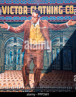 Building mural for the Victor Clothing Company featuring Anthony Quinn Stock Photo