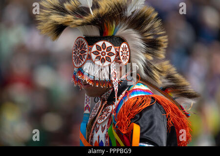 Milwaukee, Wisconsin, USA - September 8, 2018 The Indian Summer Festival Man wearing traditional native american clothing at the pow wow competition. Stock Photo