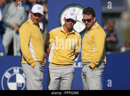 Team Europe vice captain Padraig Harrington, Team Europe's Paul Casey and Team Europe vice captain Graeme McDowell during preview day four of the Ryder Cup at Le Golf National, Saint-Quentin-en-Yvelines, Paris. Stock Photo