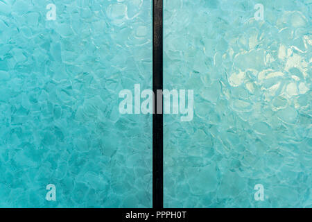 Berlin, Germany, August 31, 2018: Full Frame Close-Up of Blue Frosted Glass Window Stock Photo