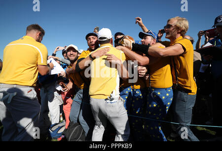 Team Europe's Paul Casey dances with Team Europe fans during preview day four of the Ryder Cup at Le Golf National, Saint-Quentin-en-Yvelines, Paris. Stock Photo