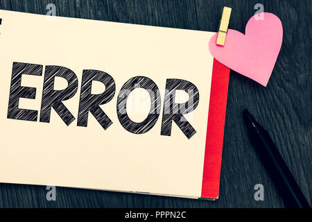 Writing note showing Error. Business photo showcasing mistake Condition of being wrong in conduct judgement didnt mean it Notebook page marker clothes Stock Photo