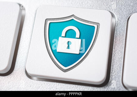 Macro Of A Blue Lock And Shield Security Icon On A Keyboard Button Stock Photo