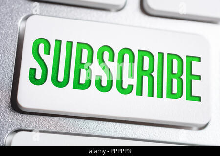 Macro Of The Word Subscribe On A Keyboard Button Stock Photo