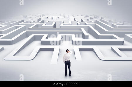 Businessman getting ready to enter a 3D flat labyrinth concept  Stock Photo