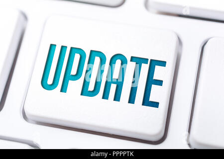 Macro Of The Word Update On A Keyboard Button Stock Photo