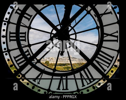 Paris cityscape through the giant clock at the Musee d'Orsay Stock Photo