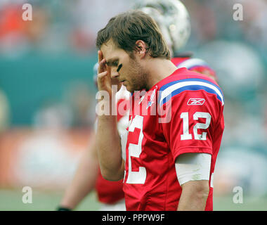 New England Patriots quarterback Tom Brady calls signals against the Miami  Dolphins at Landshark stadium in Miami on December 6, 2009 Stock Photo -  Alamy