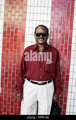 Portrait of middle age Indian man in Singapore, Southeast Asia Stock Photo
