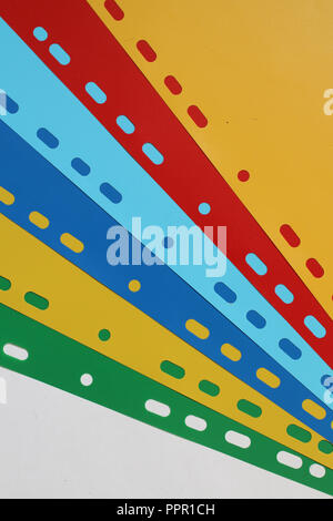 Abstract geometric background from colored sheet separators, sheets of paper, cardboard. Stock Photo