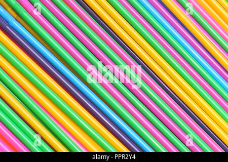 Colorful plastic drinking straws in diagonal pattern background Stock Photo