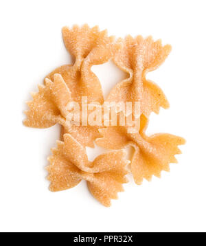 Wholewheat farfalle pasta. Tasty italian pasta isolated on white background. Stock Photo